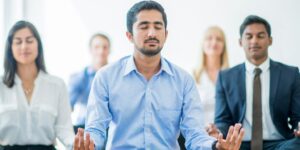 Employees doing yoga and meditation
