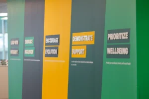 The vision wall at the Walsh Buffalo office which displays various inspirational messages.